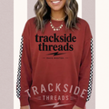 Trendy Trackside checkered drop shoulder crewneck